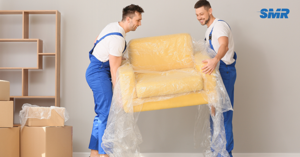2 man and van Lambeth team carrying furniture during a house move