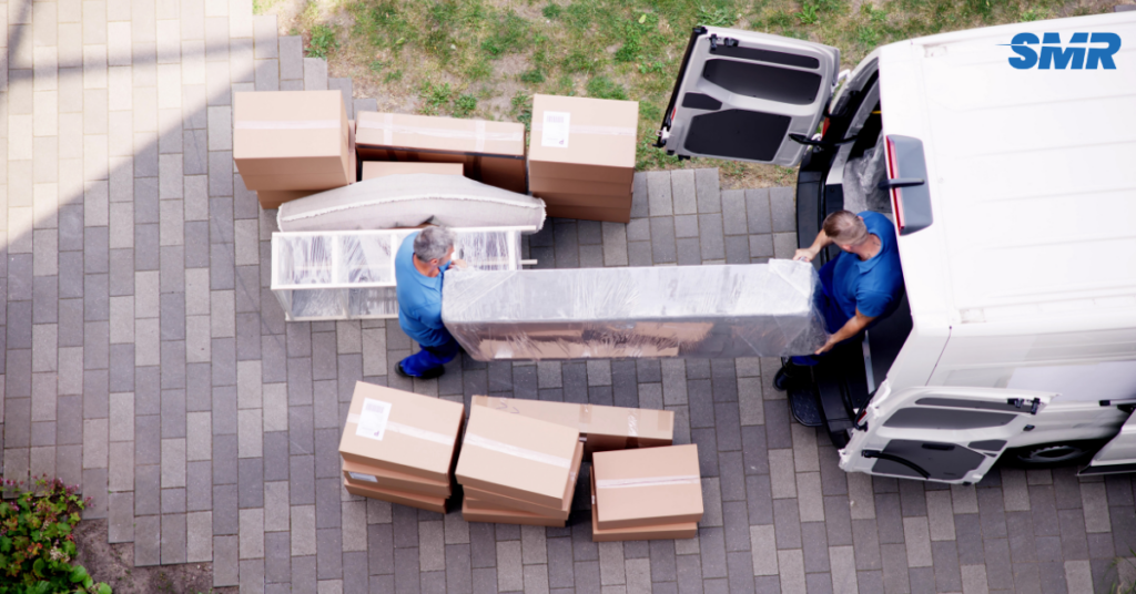 Man and Van Streatham removals team loading furniture into a van in SW16