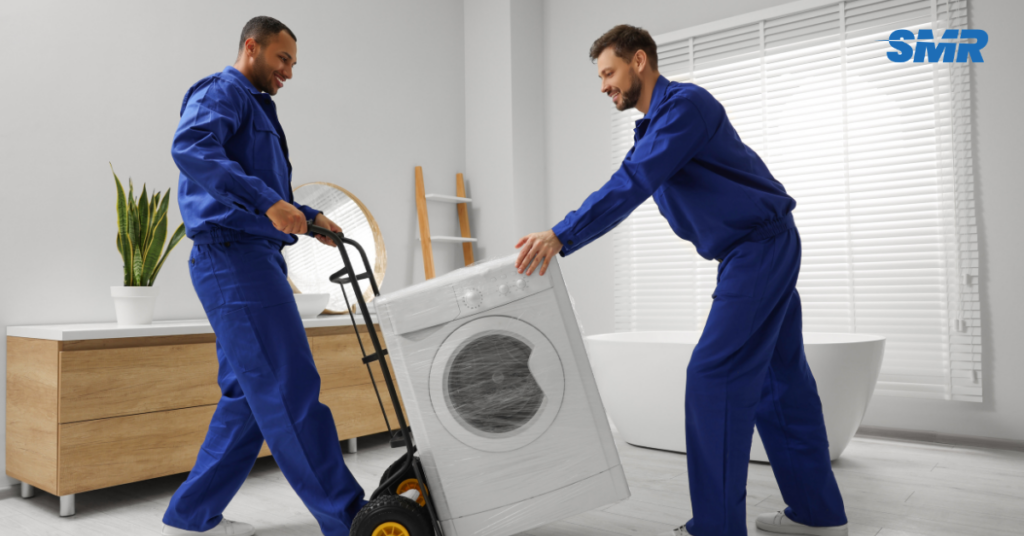 Experienced movers carrying furniture during house and flat removals in Thamesmead SE28