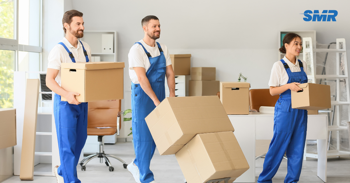 man and van Mitcham removals team loading furniture into van