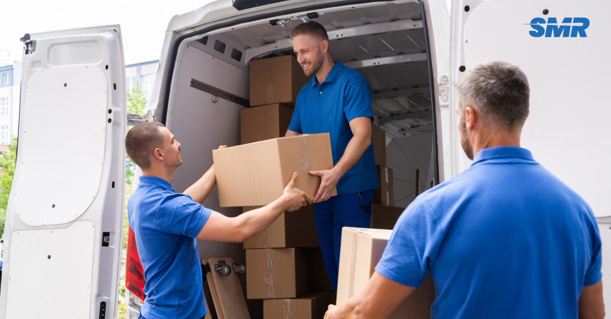 man and van Newham E12 removals team loading furniture