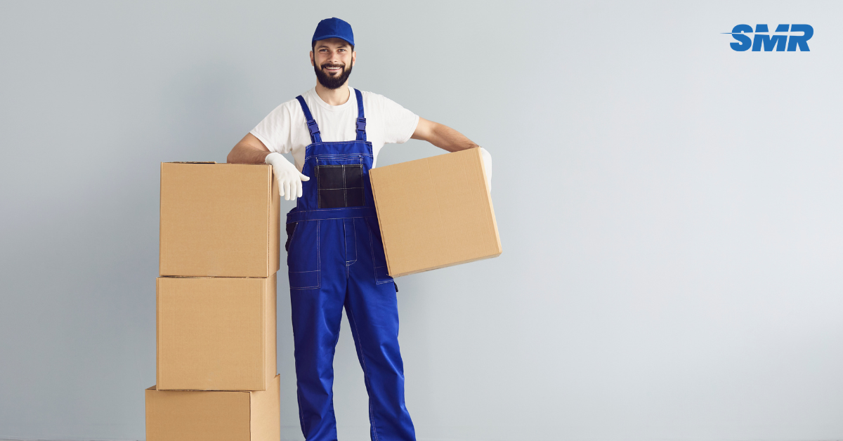 Professional man and van team loading furniture and boxes in Collier Row RM5