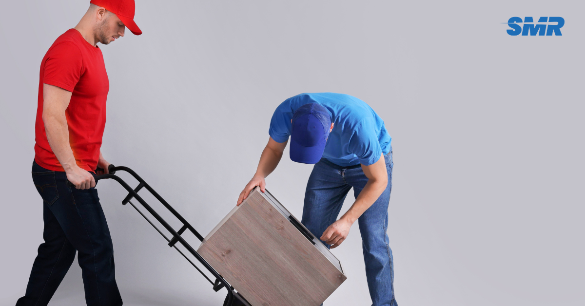 Movers handling furniture and boxes for house and flat removals in Mile End E3