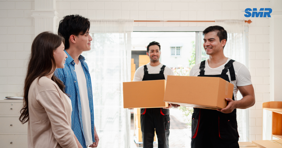 Movers transporting furniture and boxes during house and flat removals in Angel N1