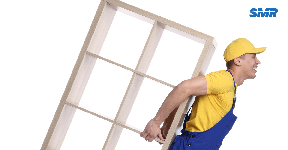 Professional Man and Van Movers Catford loading packed boxes into a removal van