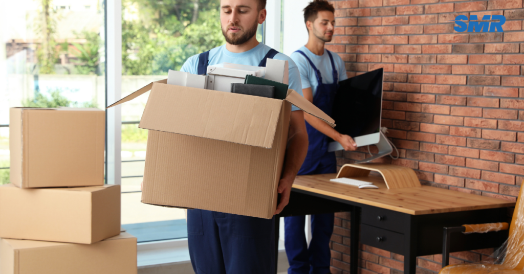 Movers transporting household furniture in NW4