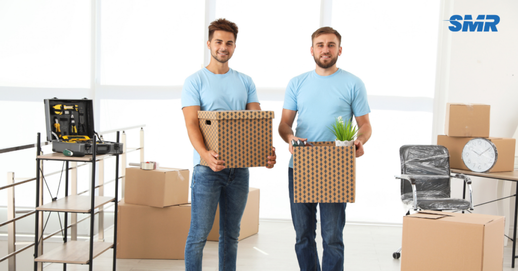 Man and Van UB5 London movers loading wrapped boxes for a same day house move