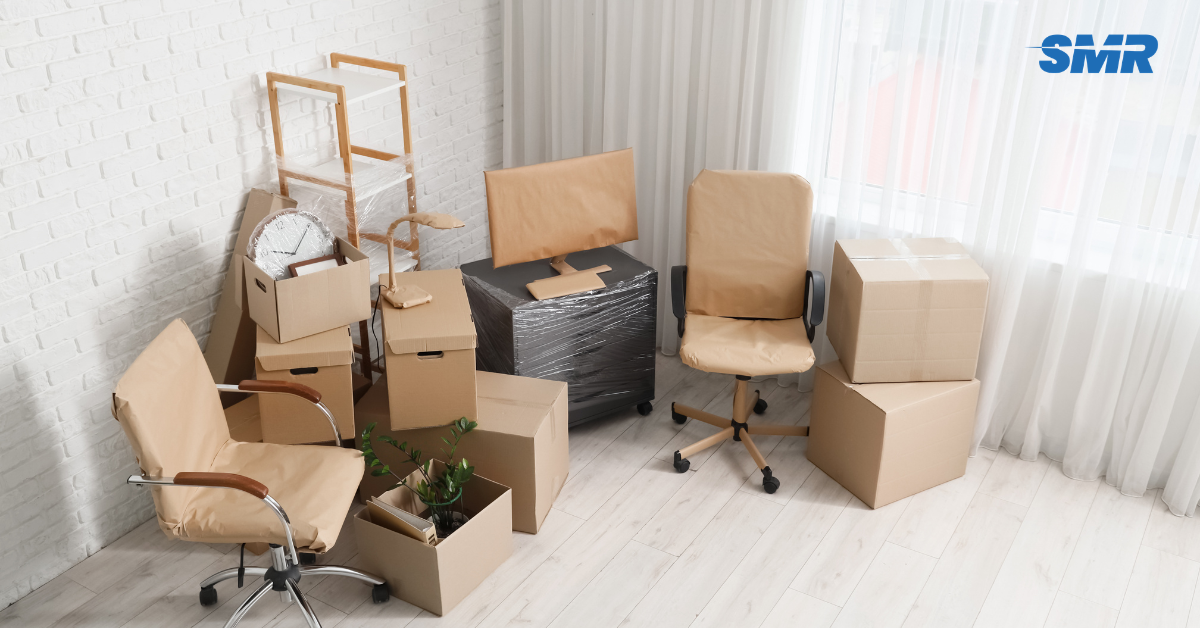 Office removals TW2 London man and van team moving business boxes and office chairs