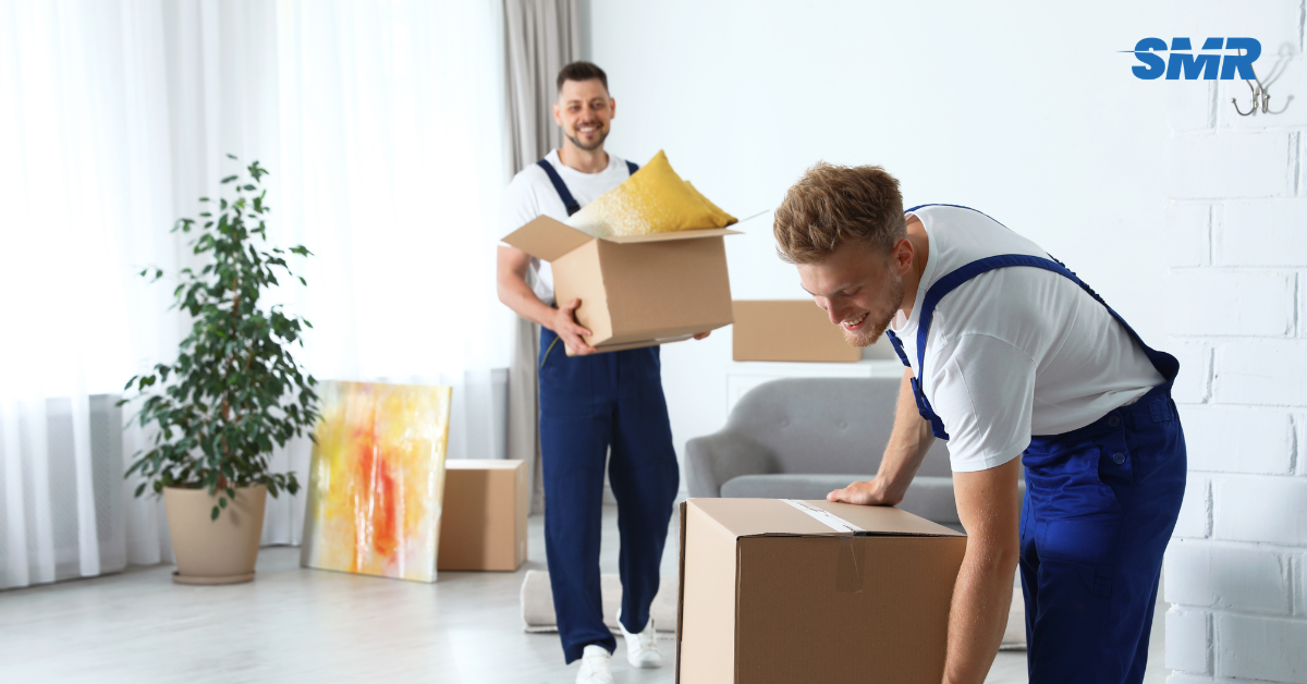 Man and Van TW1 London removals team moving wrapped boxes from a local home