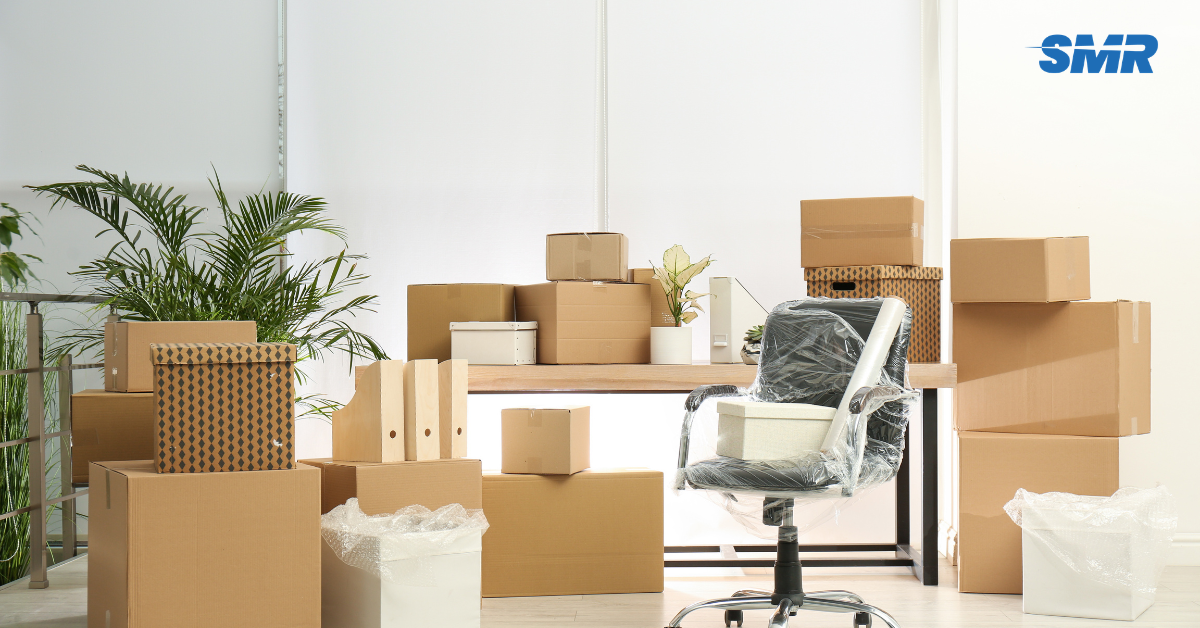 Office removals TW3 London man and van team moving business boxes and office chairs