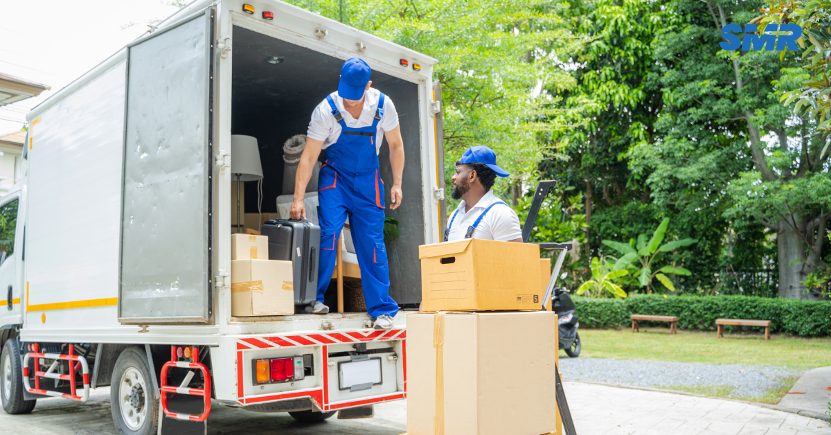Man and Van RM19 London removals team moving wrapped boxes from a local home