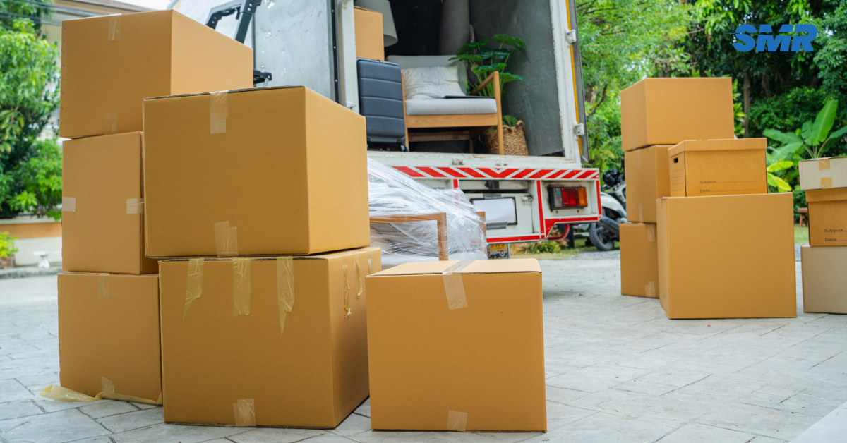 Office removals TW1 London man and van team moving business boxes and office chairs