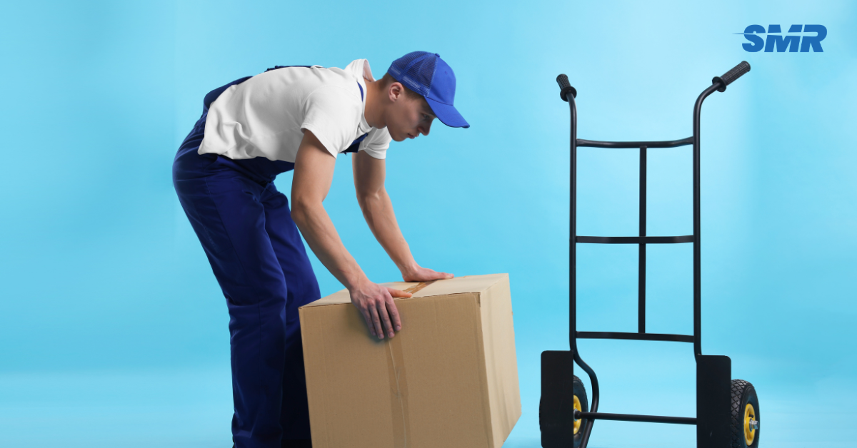 Professional removal team loading van in SE10 London
