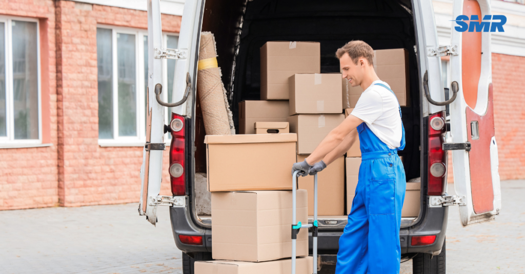 House removals Barnet and flat removals Barnet with movers carrying boxes and furniture