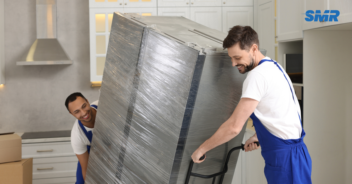Office removals SE3 London man and van team moving business boxes and office chairs