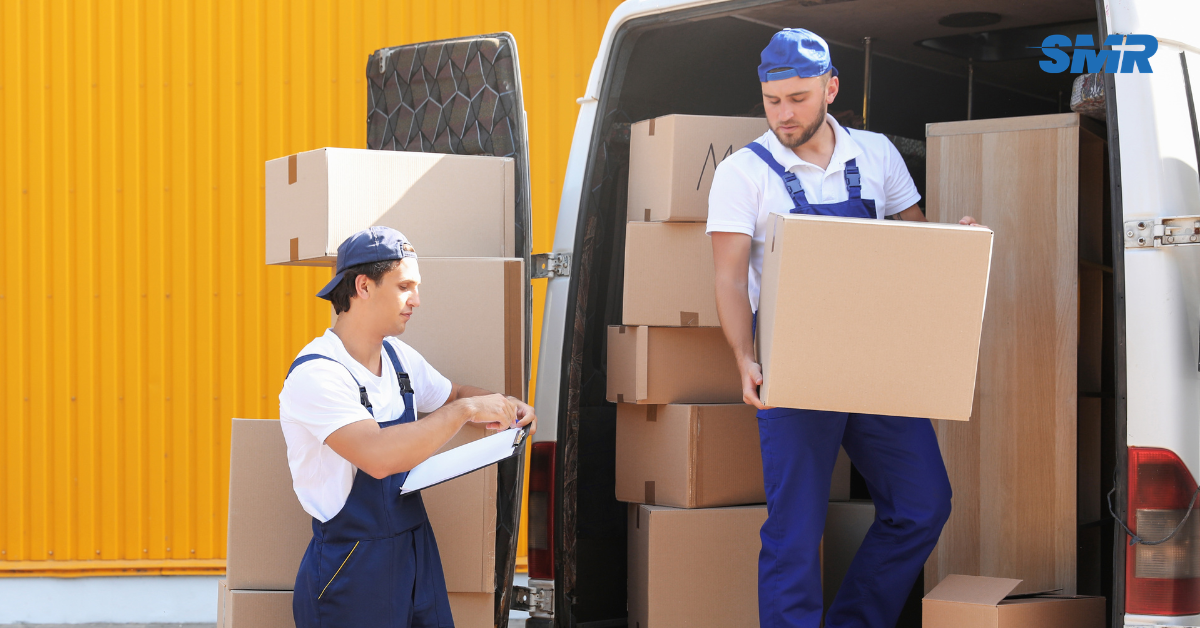 Office removals SE5 London man and van team moving business boxes and office chairs