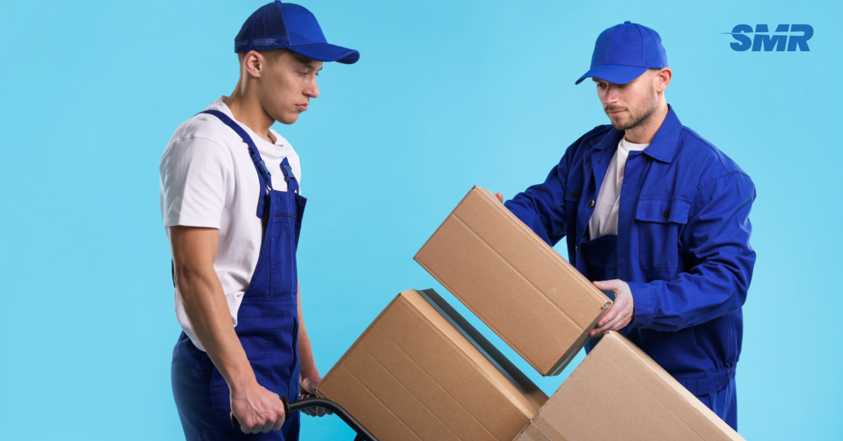 Man and Van SE6 London removals team moving wrapped boxes from a local home