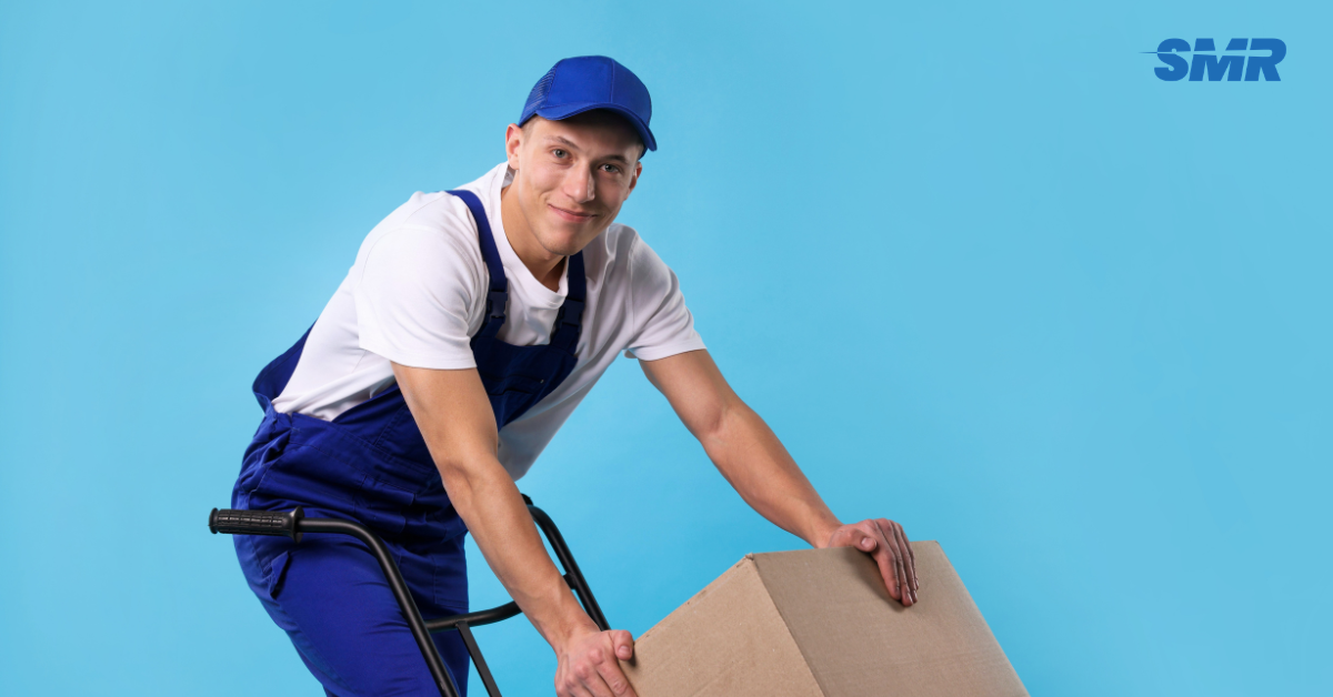 Man and Van SE7 London removals team moving wrapped boxes from a local property