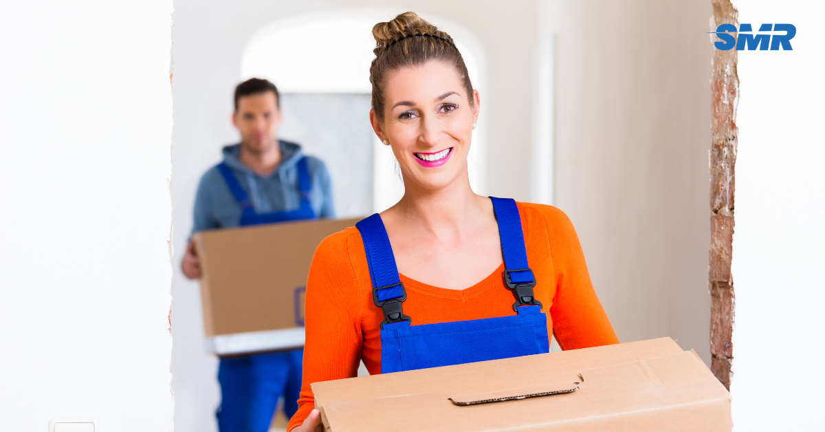 Office removals SE7 London man and van team moving business boxes and office chairs