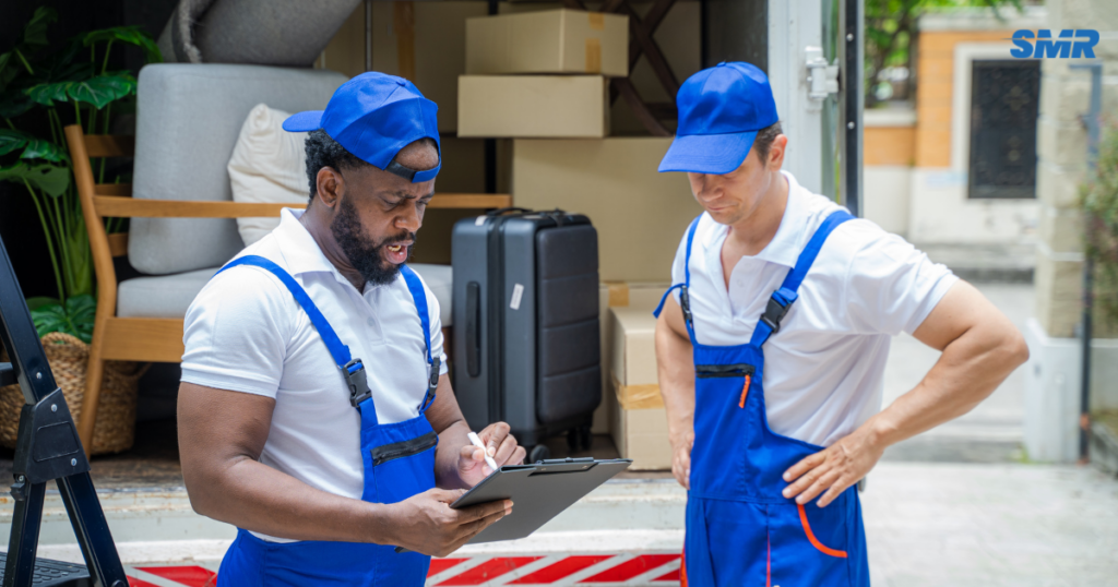 Movers transporting boxes in Chingford E4 for house and flat removals