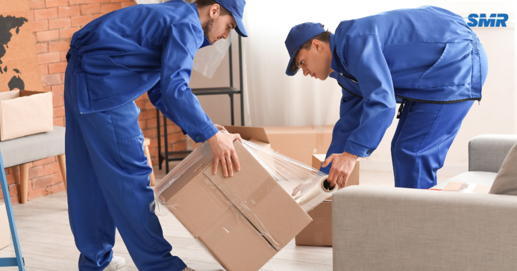 Flat removals Finsbury N4 movers transporting furniture into a modern apartment building
