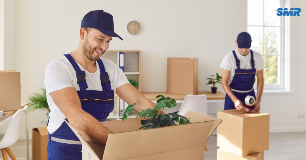 Man and Van Fulham movers loading furniture and moving boxes into a removals van