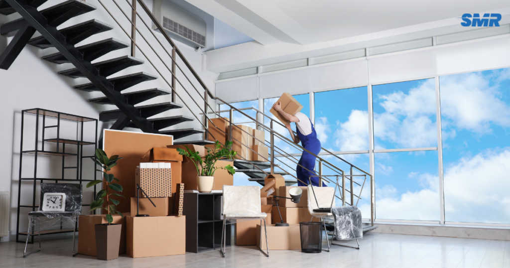 Flat removals Fulham SW6 movers transporting furniture into an apartment building