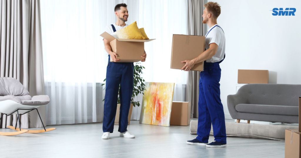 Flat removals and office removals UB5 London movers carrying labelled boxes and office equipment