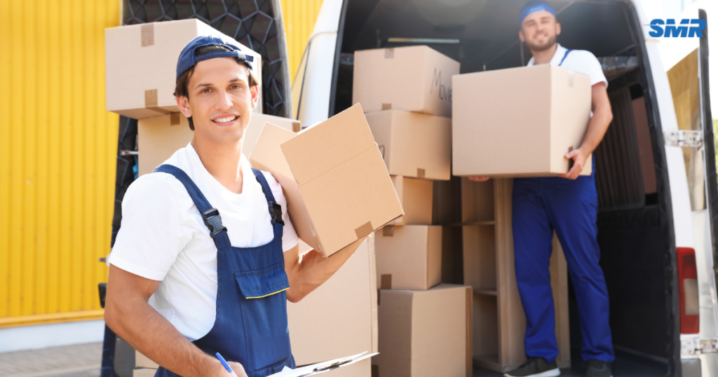 House removals Golders Green movers transporting furniture into a family home