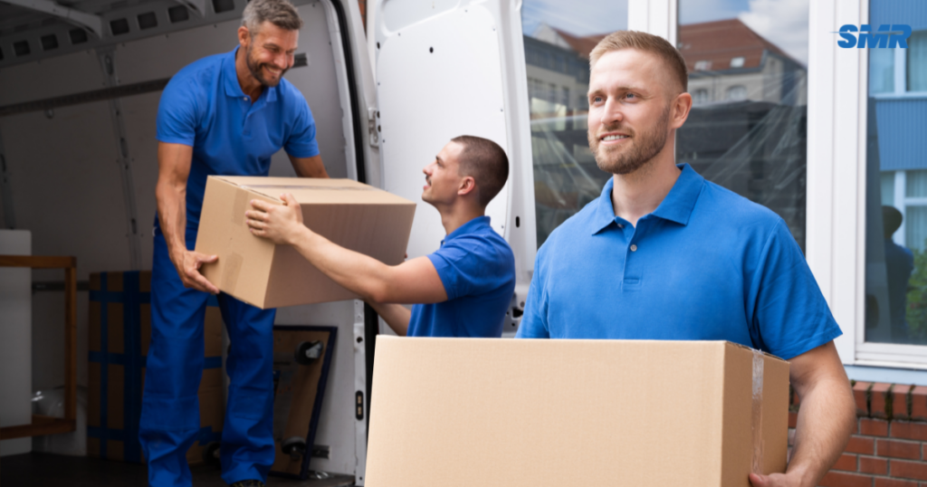 Professional movers transporting boxes and furniture for house and flat removals in Rainham