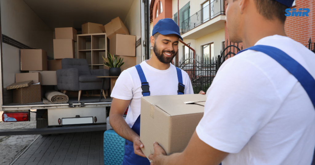 House removals Gunnersbury movers transporting furniture into a family home