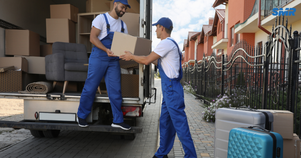 Man and Van Ealing W13 removals team moving household furniture into a property
