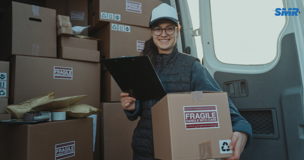 Movers transporting boxes and furniture for house and flat removals in Chiswick W4