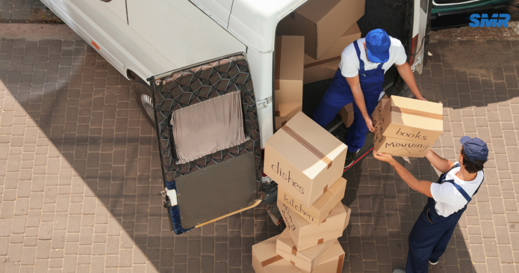 Movers transporting boxes and furniture for house and flat removals in Van Chingford