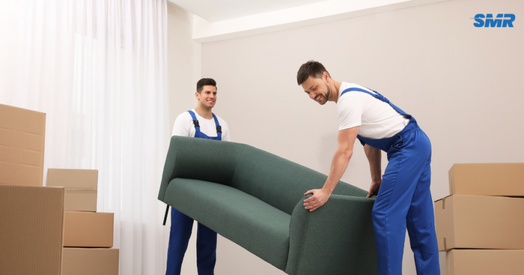 Movers transporting boxes and furniture for house and flat removals in Clapham