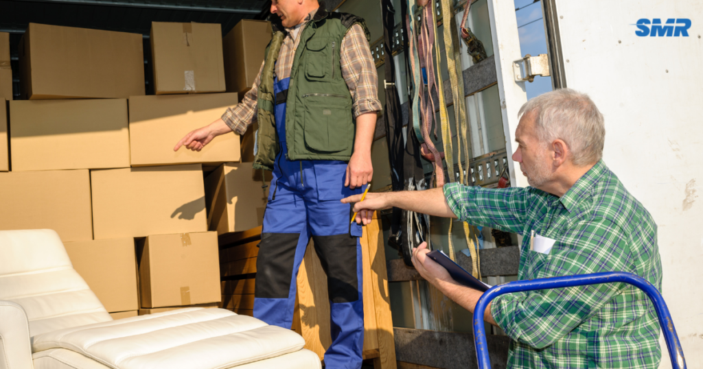 Professional movers transporting boxes and furniture for house and flat removals in Chelsea W2