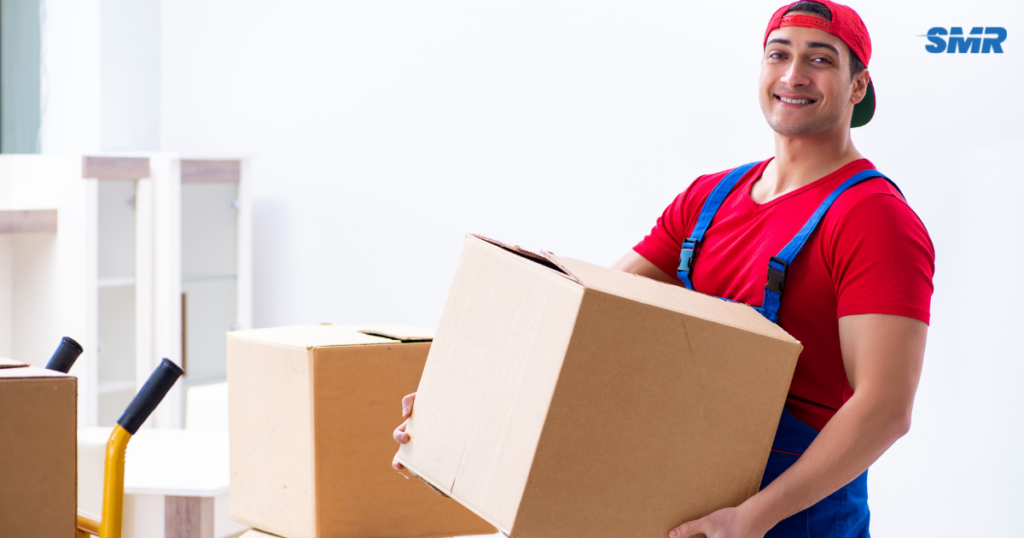Man and Van Elephant and Castle movers loading furniture and boxes into a removals van