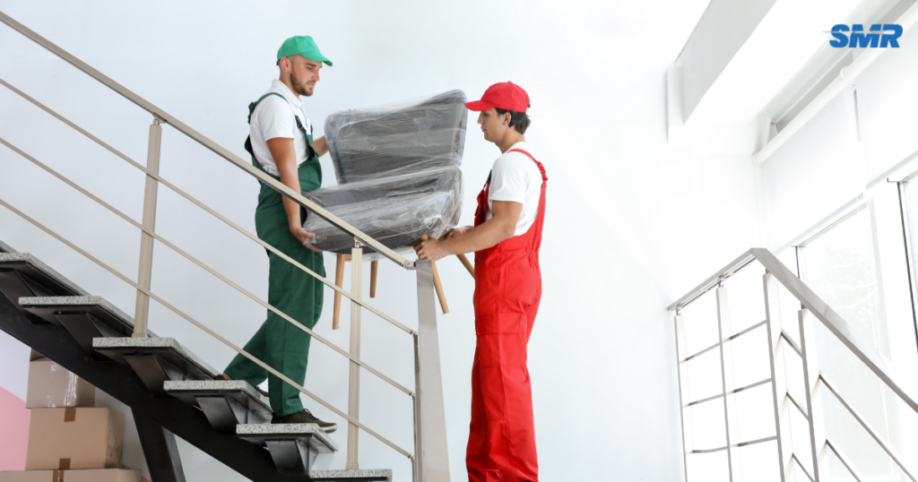 Flat removals Finsbury movers transporting furniture into a modern apartment