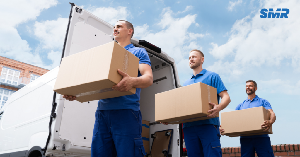 Movers handling furniture and boxes in SW6